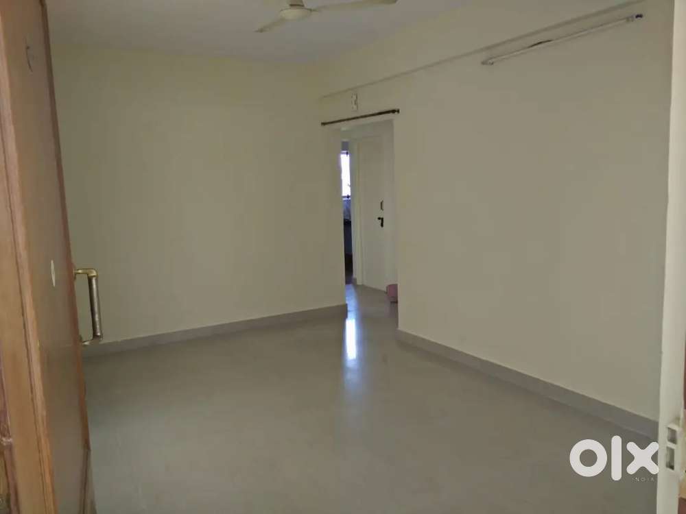 Semi furnished 2BHK corner east facing flat for rent