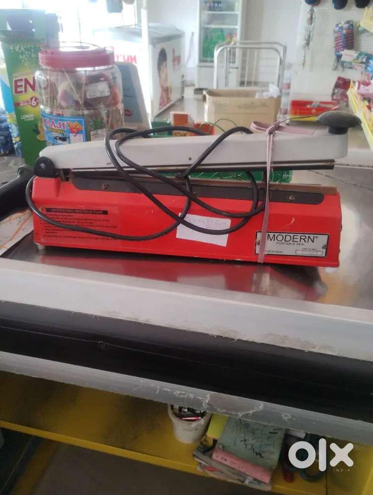 Weighing machines and sealing machine