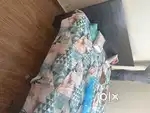 Brown colour bed without box along with side table