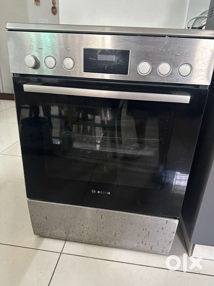 Free standing ceramic top bosch electric cooking range