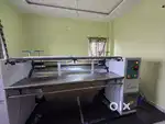Saree rolling machine.