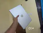 HP i5 1TB laptop with Windows 11, Microsoft Office activated.