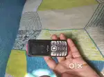 Vox keypad phone with charger
