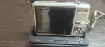 Casio Digital Camera with charger, case and cables and r with SD card
