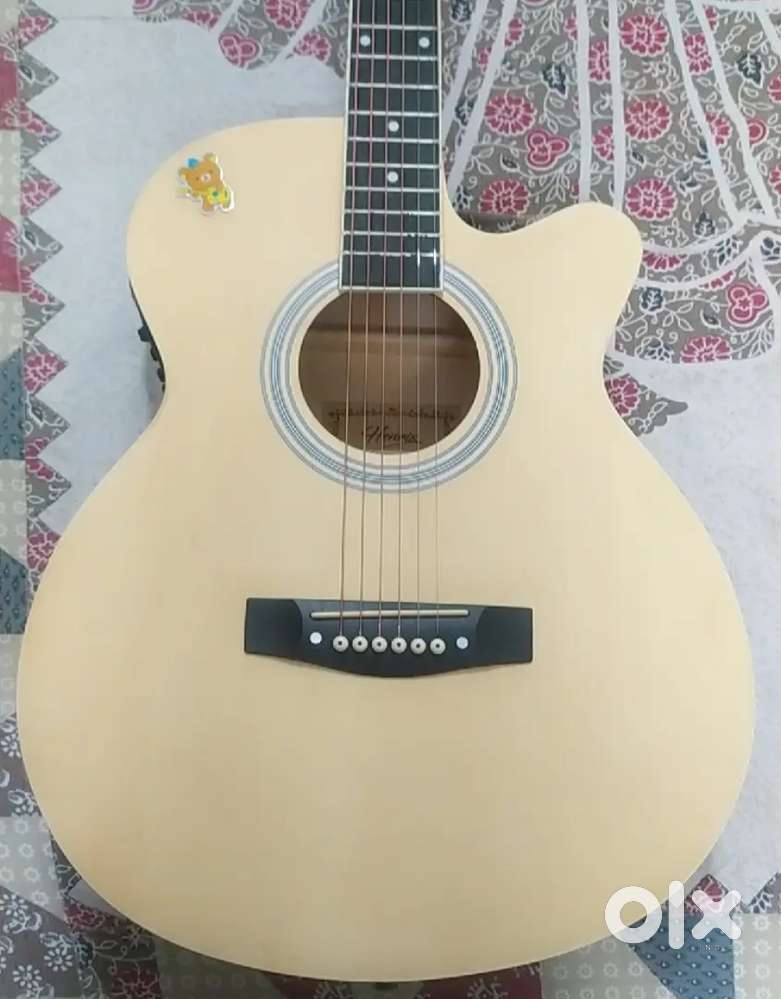 Henrix Acoustic Guitar + Bag + Tuner + Capo + Stand (Good Condition)