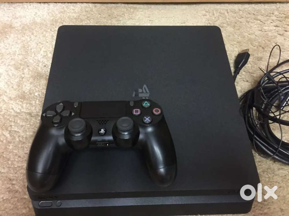 PS4 Slim with 2 disk games for sale
