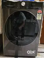 Lg 12 Kg Front Load Washing Machine with LG Warranty 2 month old.