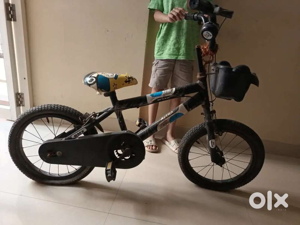 Bicycle for age 4 to 7 years. Black color. Good condition