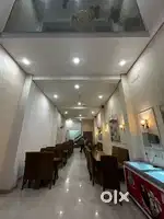 Sell running restaurent owner going abroad