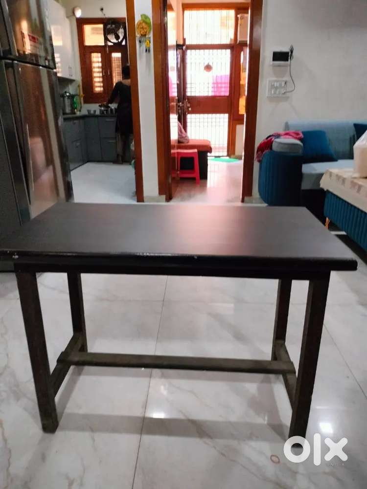 Wooden table in perfect condition with drawer and one stool with box