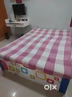 Kids double bed with another under bed and storage