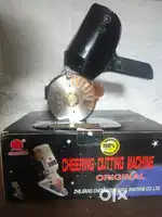 CLOTH CUTTING MACHINE
