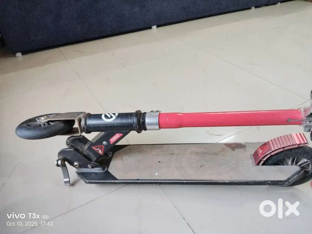 Oxelo scooter mid  red 16 selling
