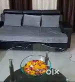Seven seater sofa with centre table