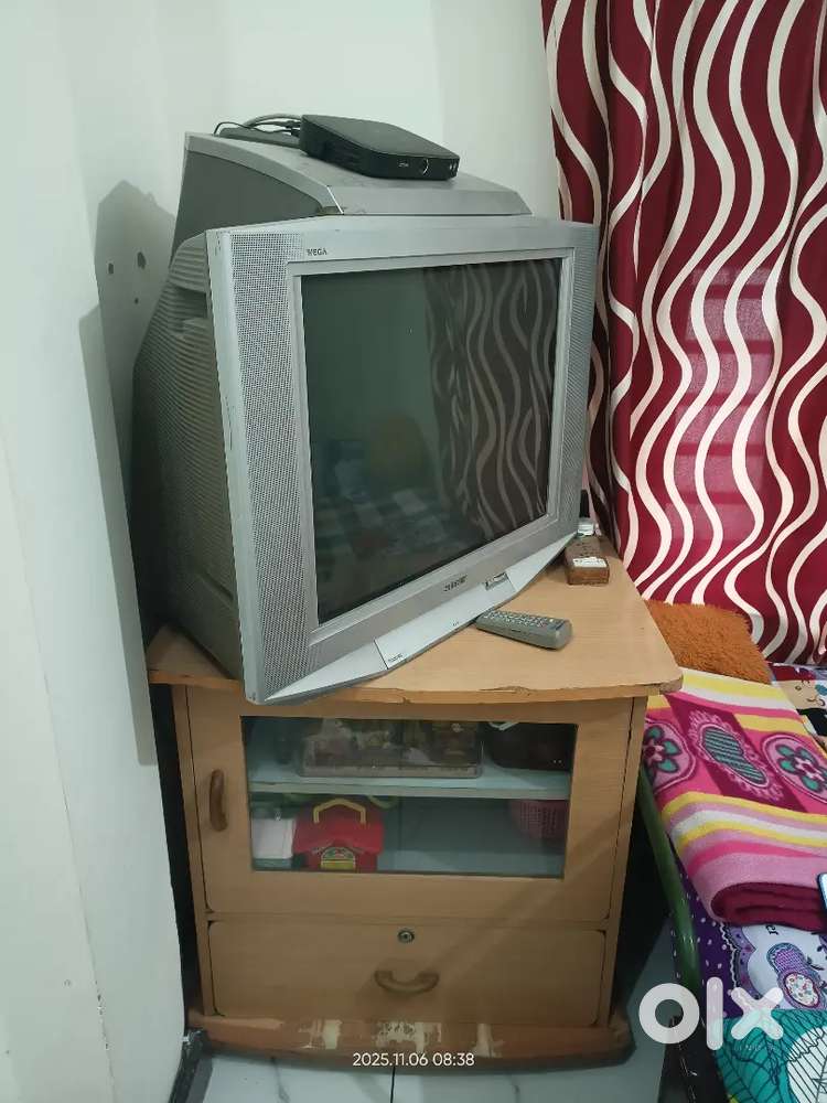 A Full base Sony Big TV 29 inch with Heavy Wooden Trolley