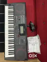 CASIO CT-X9000IN with cover and stand