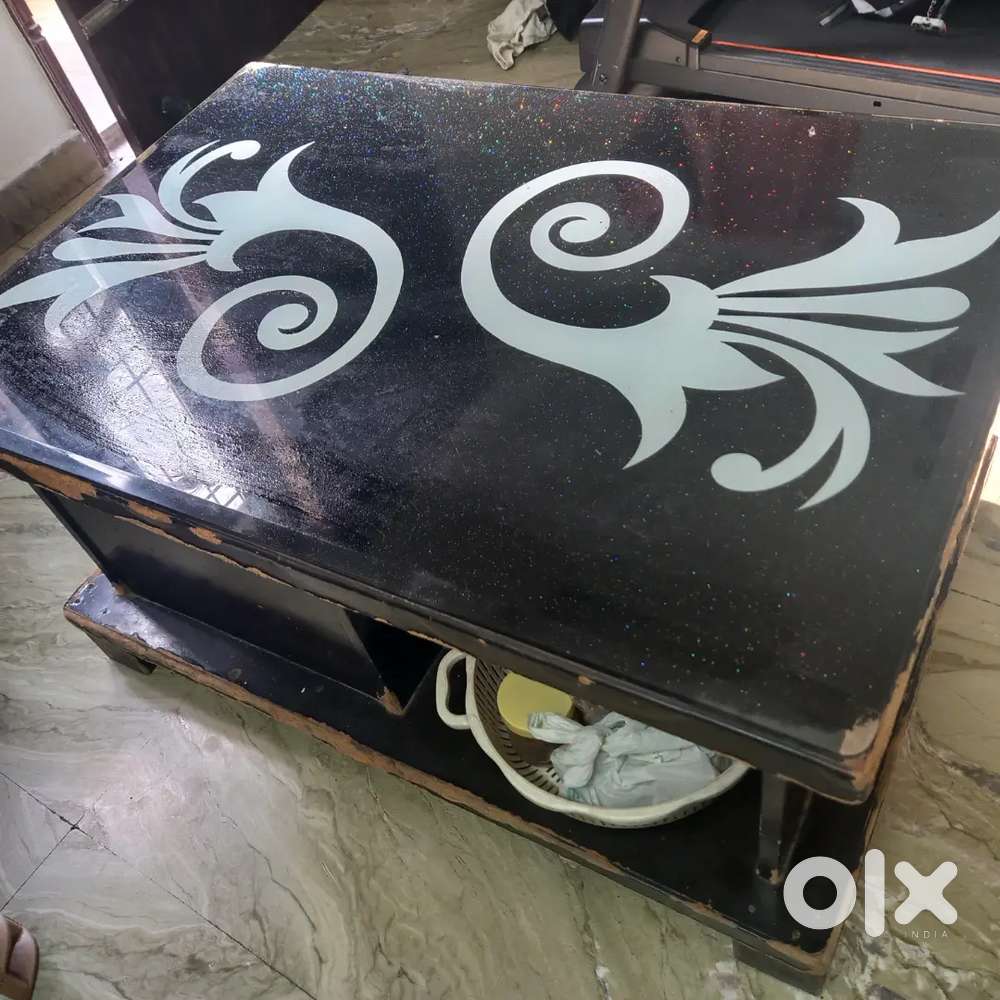 Wooden table with non breakable designer glasss