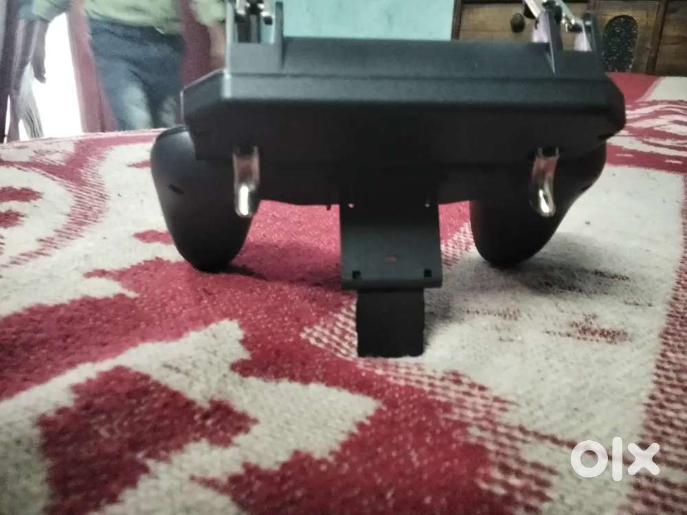 This is phone holder for free fire and bgmi with trigger