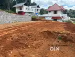 Plot for sale near Manarkad junction 10 cent two sides road frontage