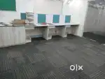 Used Office floor mat. Office workstation. Glass partition