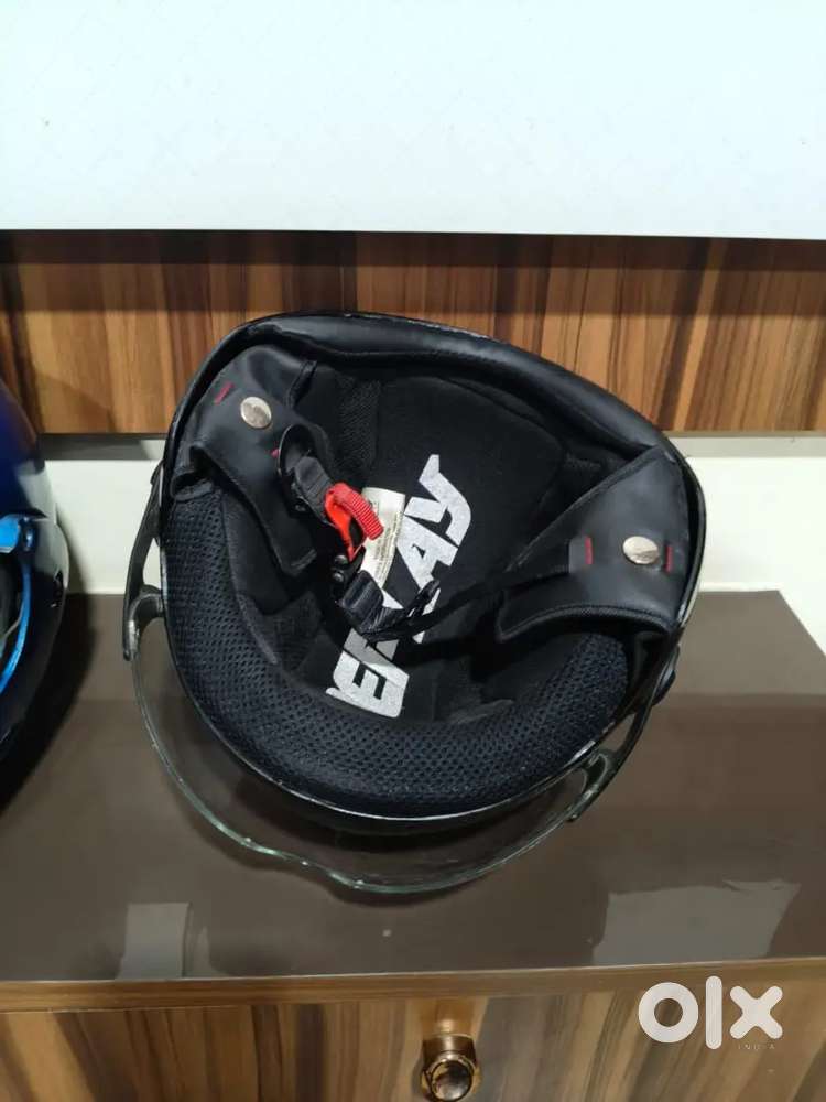 Helmet with clasp