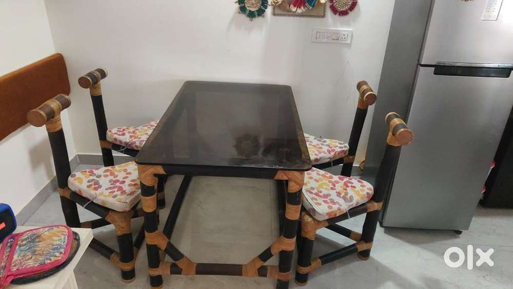 Stylish 4-Seater Wooden Dining Table with Glass Top & Cushioned Chairs