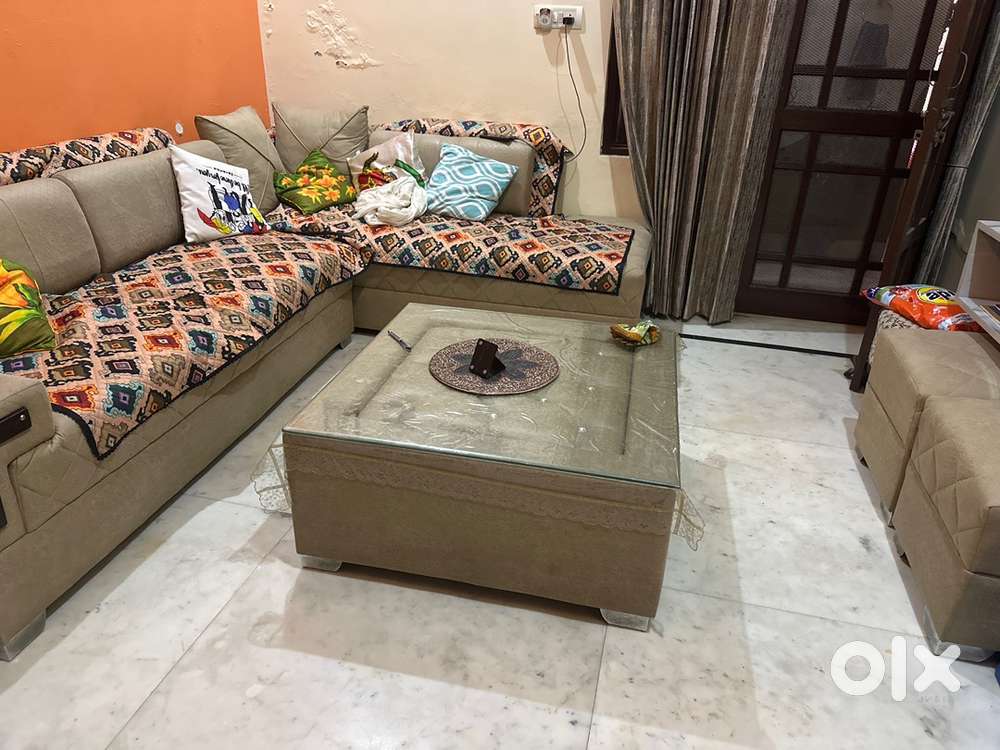 New L type sofa with 2 puffies and table