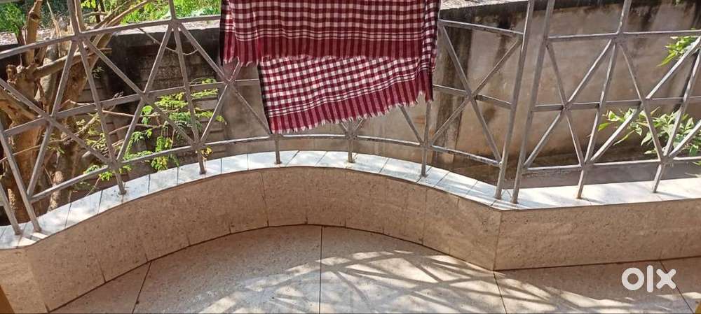 Tile flooring , two  bed room modified house for family.