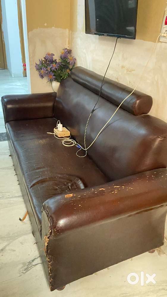 4 seater sofa and mini facial bed ith storage