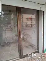 Door of glass with aluminium frame 7.6*7 feet height