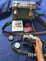 Fujifilm XT200 with 15-45mm kit lens + Leather bag + 16gb SD card