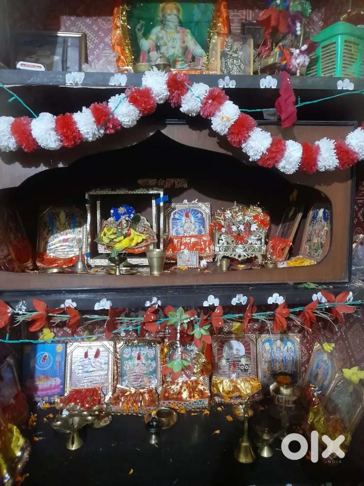 One wooden Puja temple .one bed rode .one study table