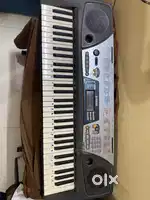 Yamaha PSR-175 portable keyboard with keyboard stand