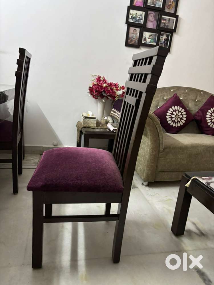 Wodden 6 chair and glass top dining table
