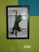 Glass framed black cat painting