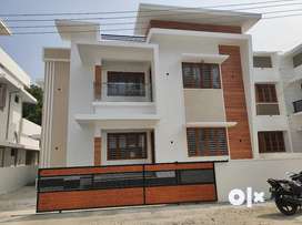 AN ELEGANT NEW 4BED ROOM 1600SQ FT HOUSE IN MANNUTHY,THRISSUR