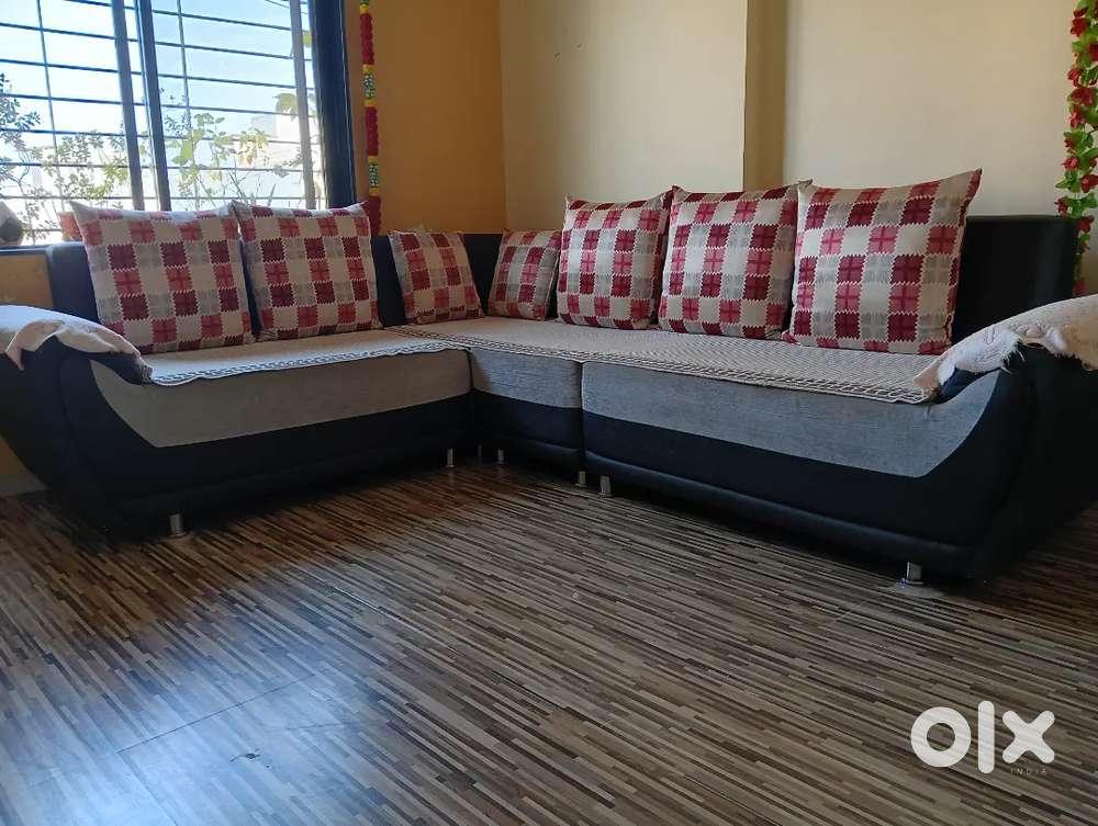 Designer and stylish Sofa with 5 big and 2 small pillows , 3 years .