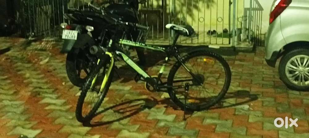 Sale the new cycle...6 months old ...with  helmet,number lock