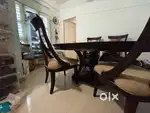 Dining table and free teapoy