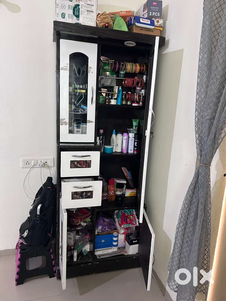 Dressing with draw and storage