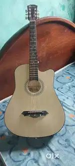 Revel acoustic guitar for sale Excellent condition smooth sound