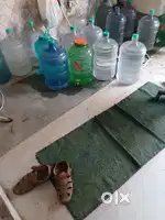 Kishan toting Wali 20 liter jar in beas