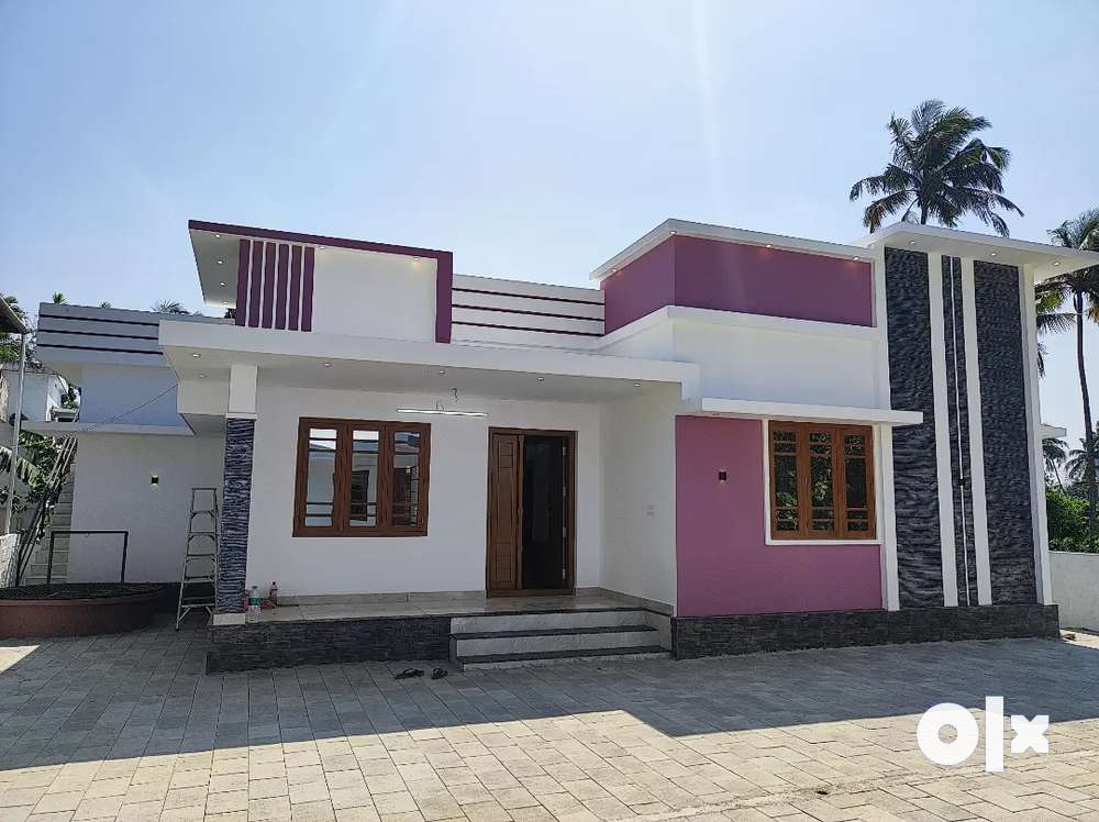 AN ELEGANT NEW 3BED ROOM 1150SQ FT 5.6CENT HOUSE IN NADATHARA,THRISSUR