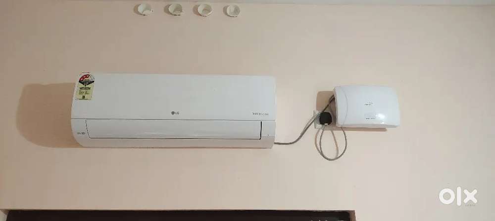 New LG 1 ton air conditioner with V guard stabilizer for salefor 24k.