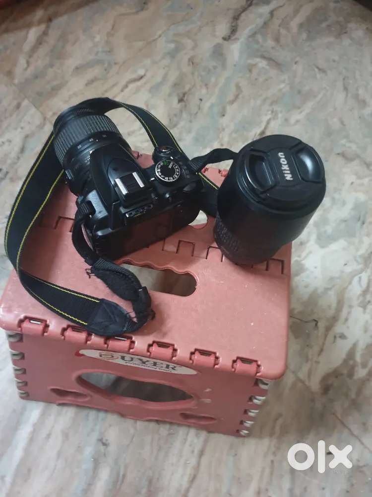 Nikon Cameras EM and DSLR D3100