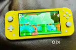 Nintendo switch lite yellow I'm mint condition