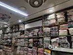 Sales man and helpers for wholesale clothing store