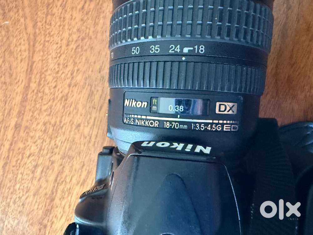 Nikon D3100 DSLR + 18-70mm lens + 2 batteries + charger + case