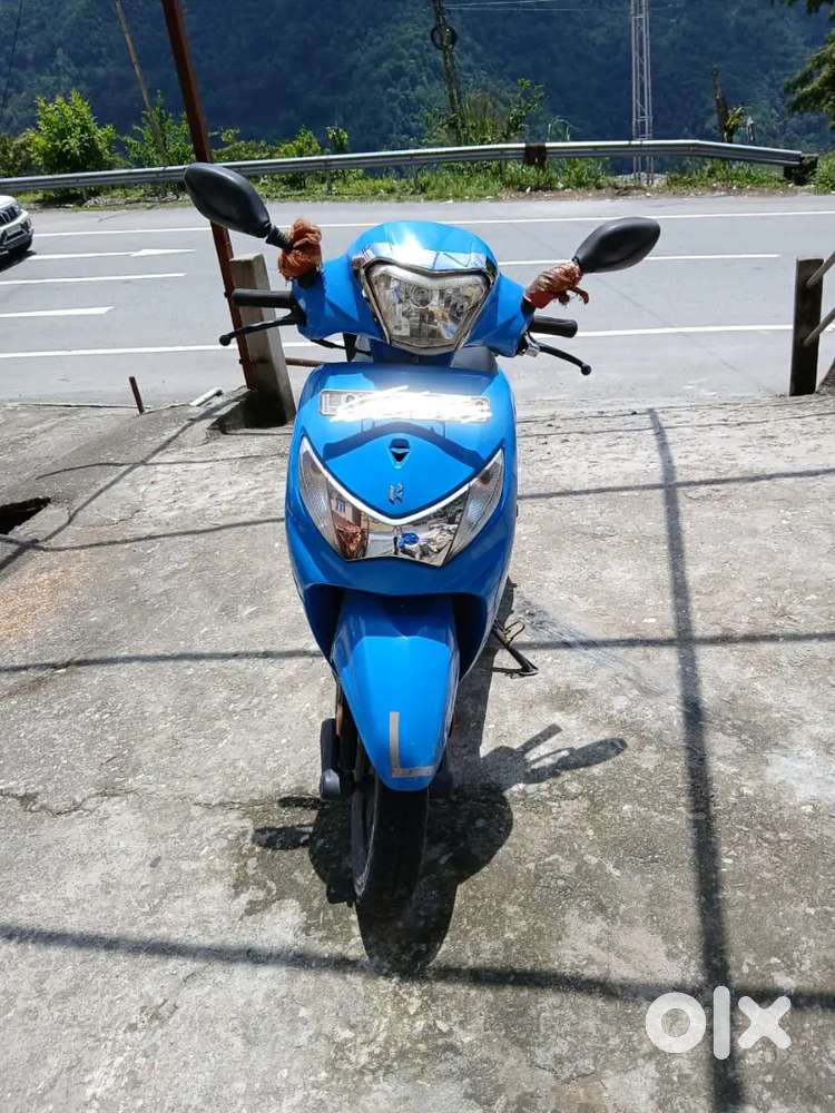 All documents clear and in good condition , one hand scooty