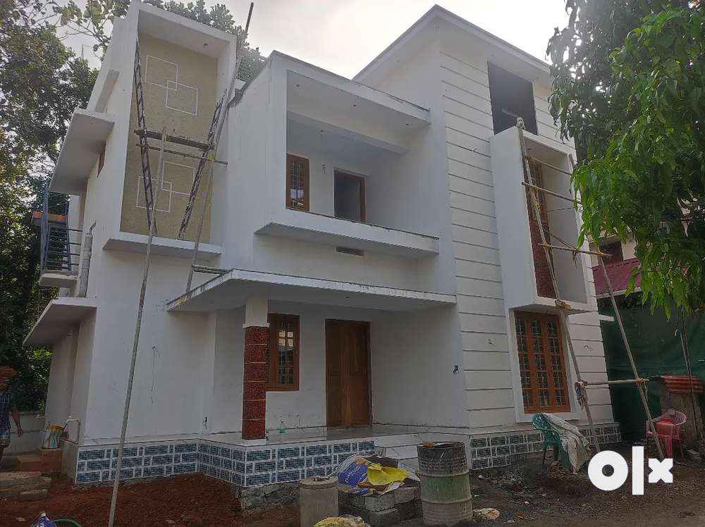 A SUPERB NEW 3BED ROOM 1500SQ FT HOUSE IN KOLAZHY, THRISSUR